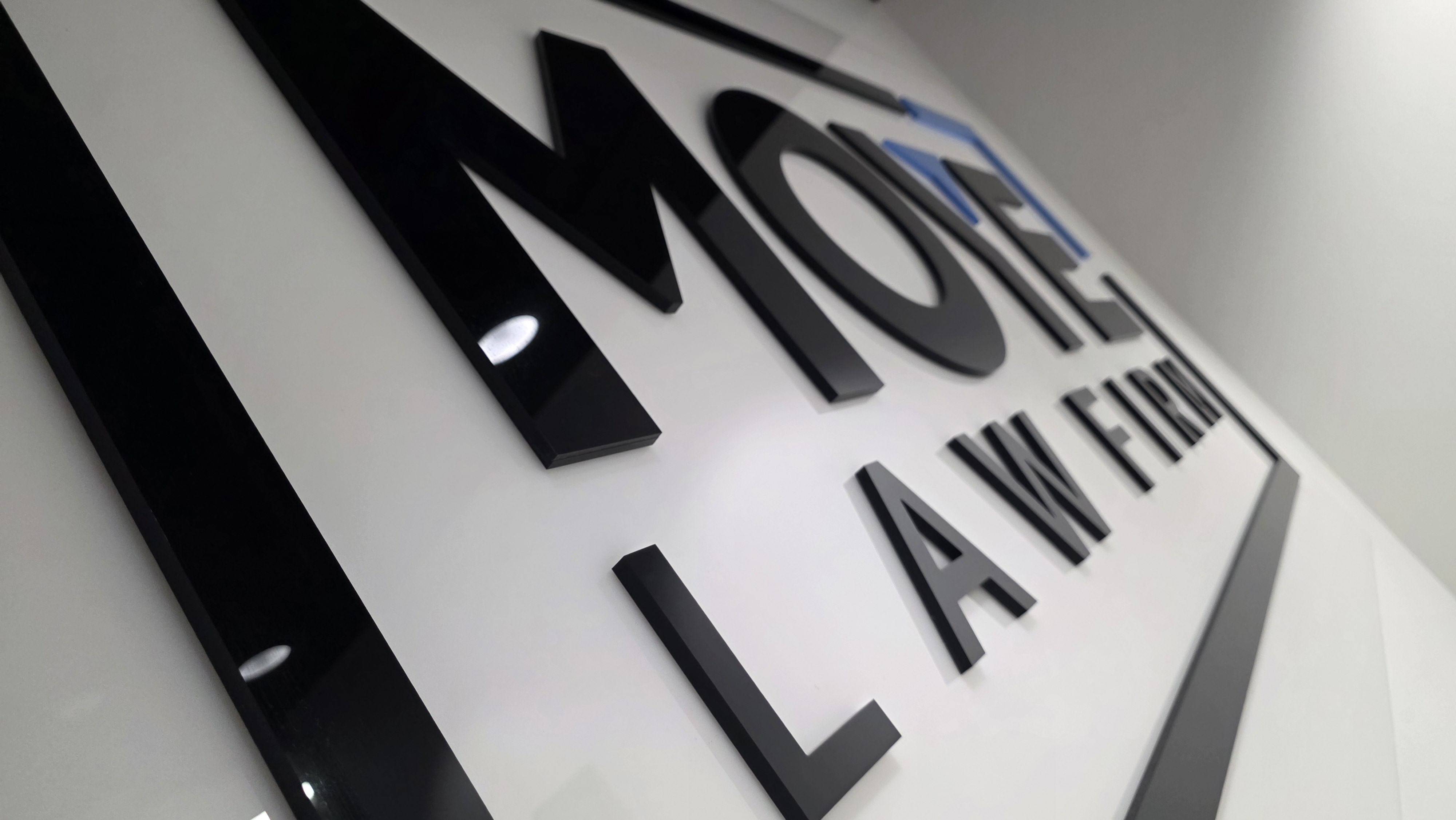 Sleek Acrylic Reception Sign – Moye Law Firm