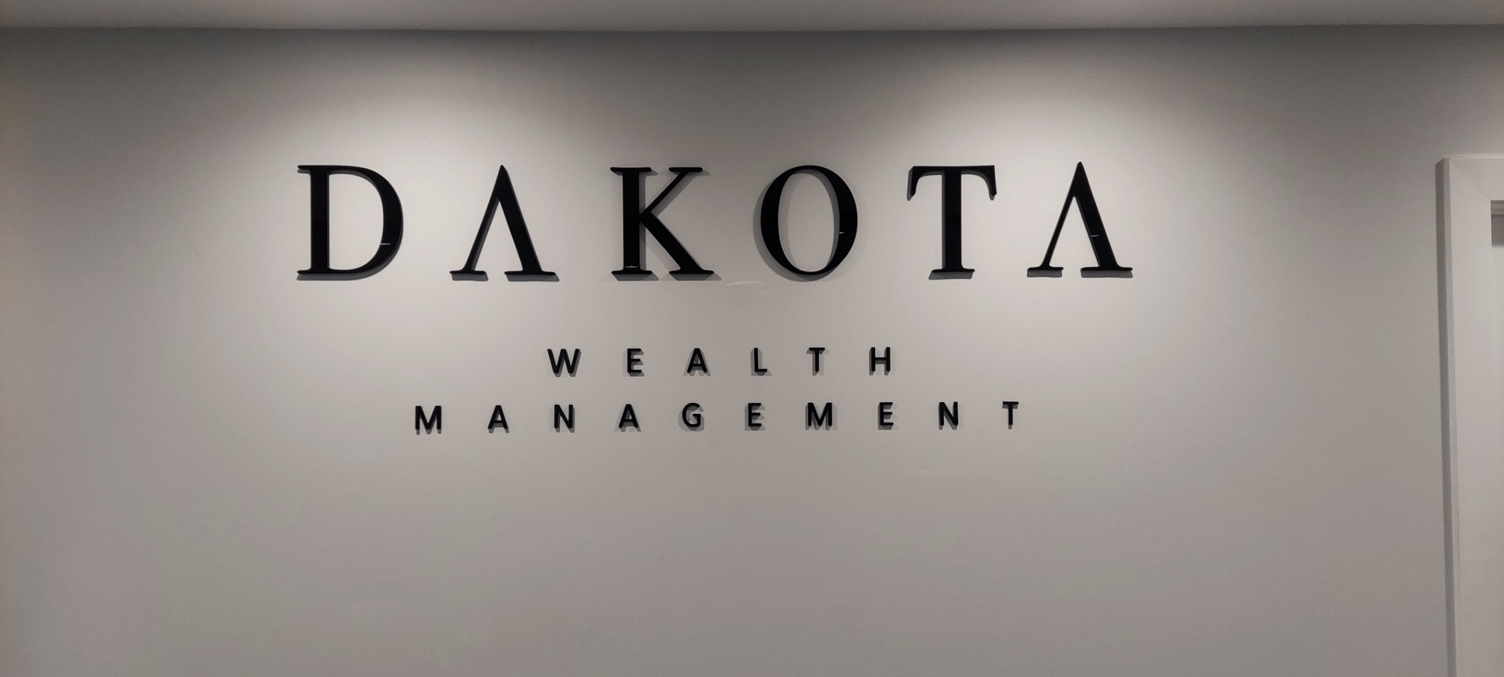 Indoor signage installed for a wealth management firm