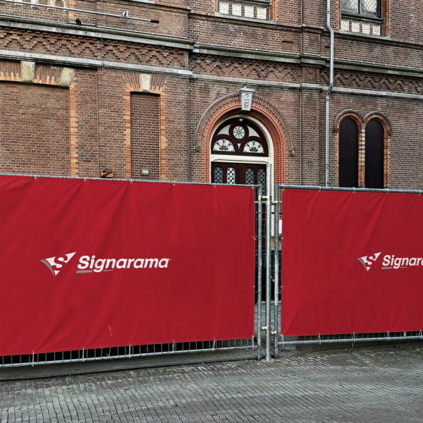 Vinyl banner in place saying Signarama.