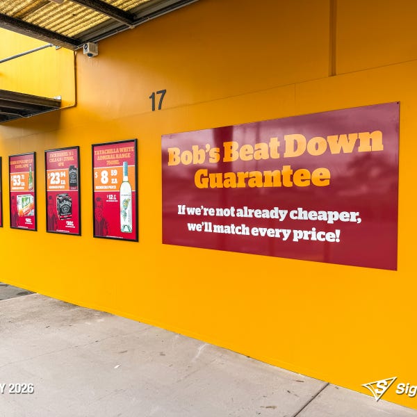 Exterior and interior signage installed by Signarama Springwood at Bob’s Bulk Booze Tingalpa, featuring bold storefront branding and cohesive in-store graphics creating a strong, p...