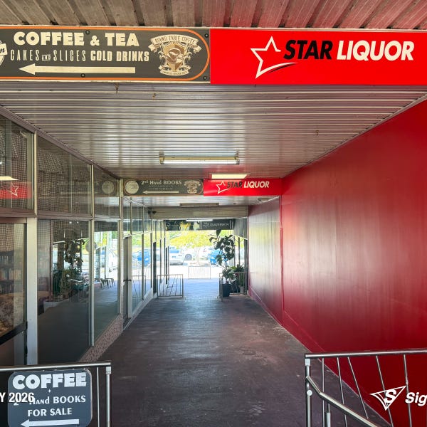 Exterior and interior signage installed by Signarama Springwood at a Star Liquor store, featuring illuminated storefront branding and cohesive in-store graphics for a complete reta...