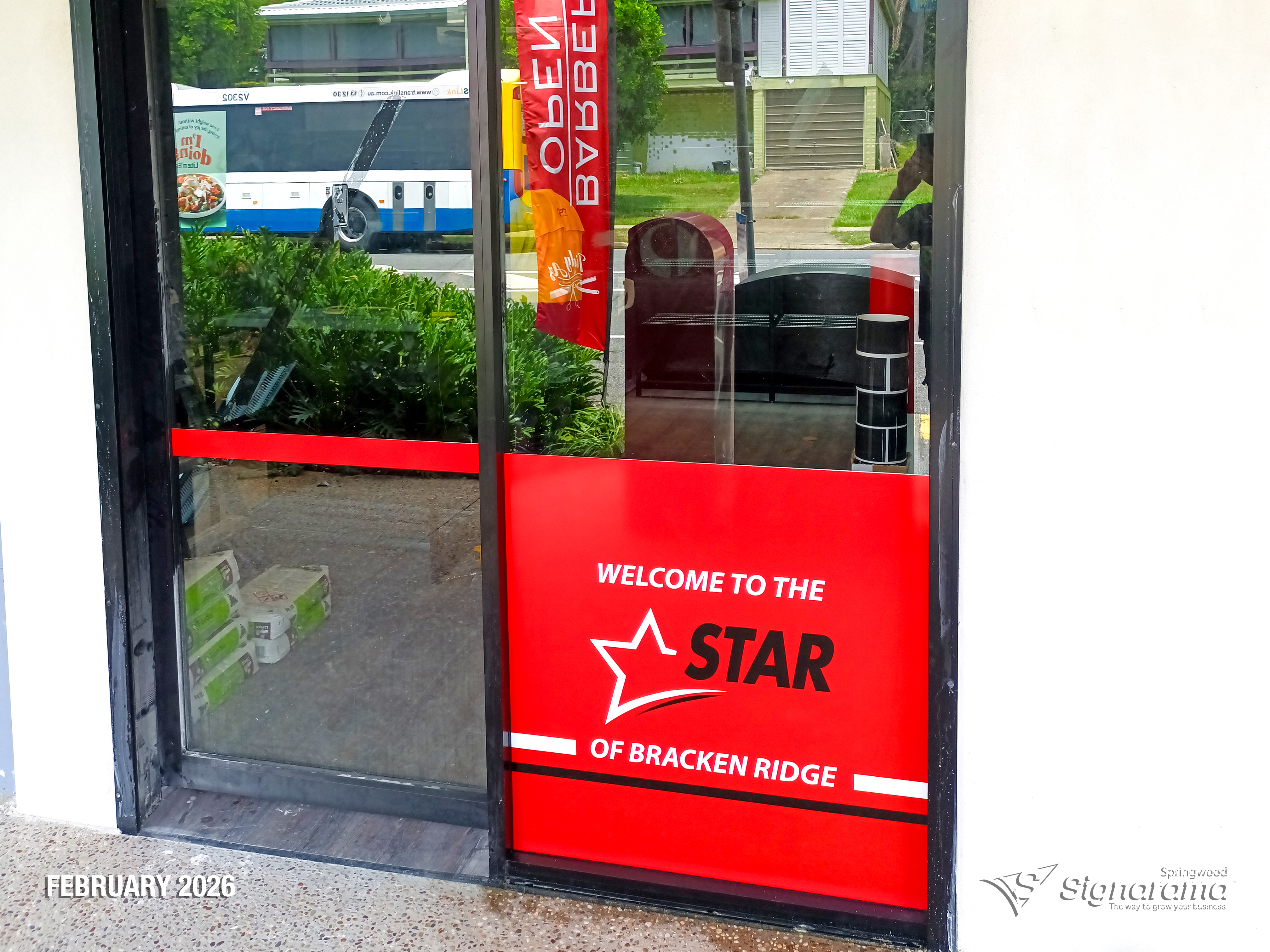 Exterior and interior signage installed by Signarama Springwood at a Star Liquor store, featuring illuminated storefront branding and cohesive in-store graphics for a complete reta...