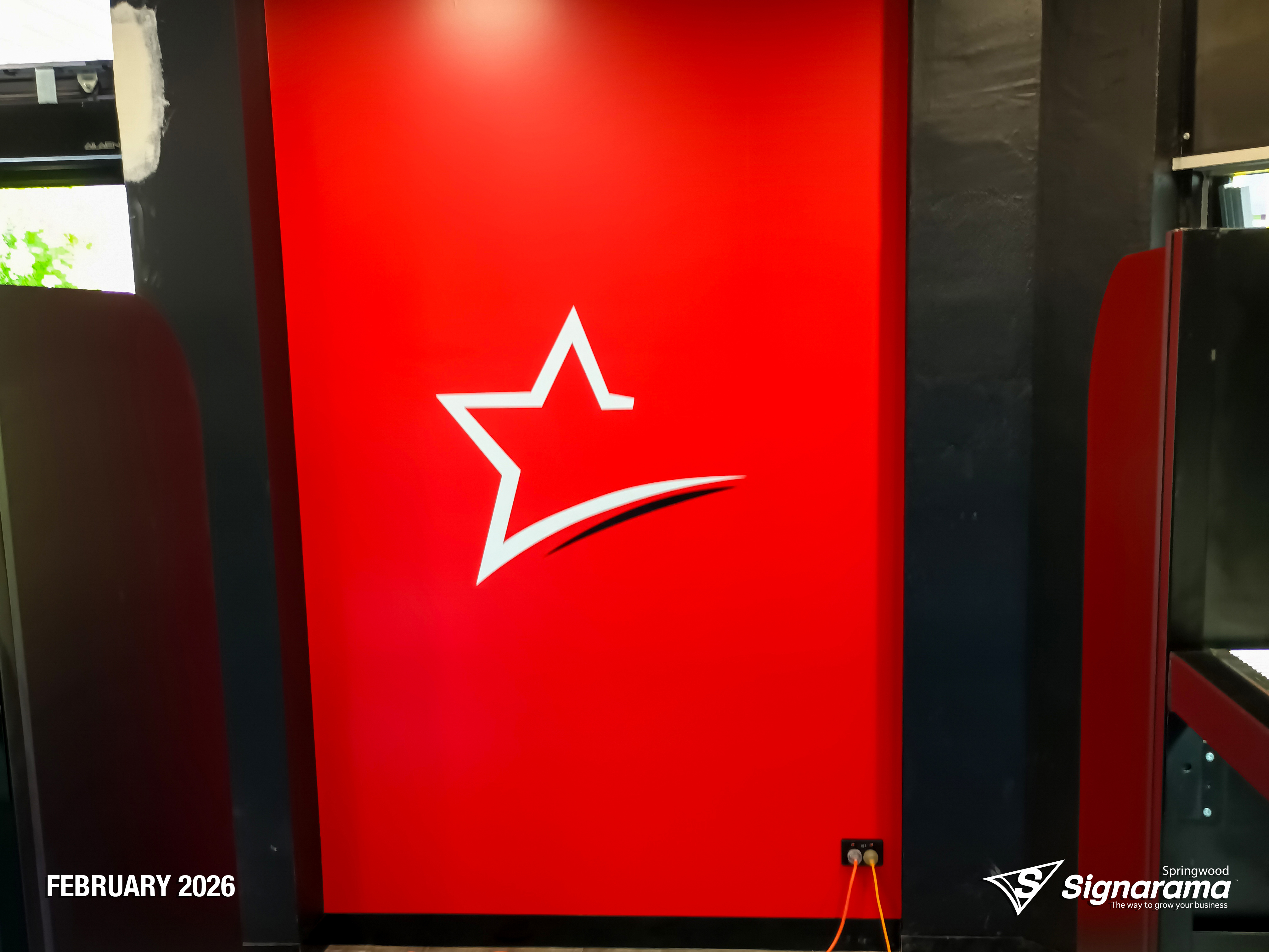 Exterior and interior signage installed by Signarama Springwood at a Star Liquor store, featuring illuminated storefront branding and cohesive in-store graphics for a complete reta...