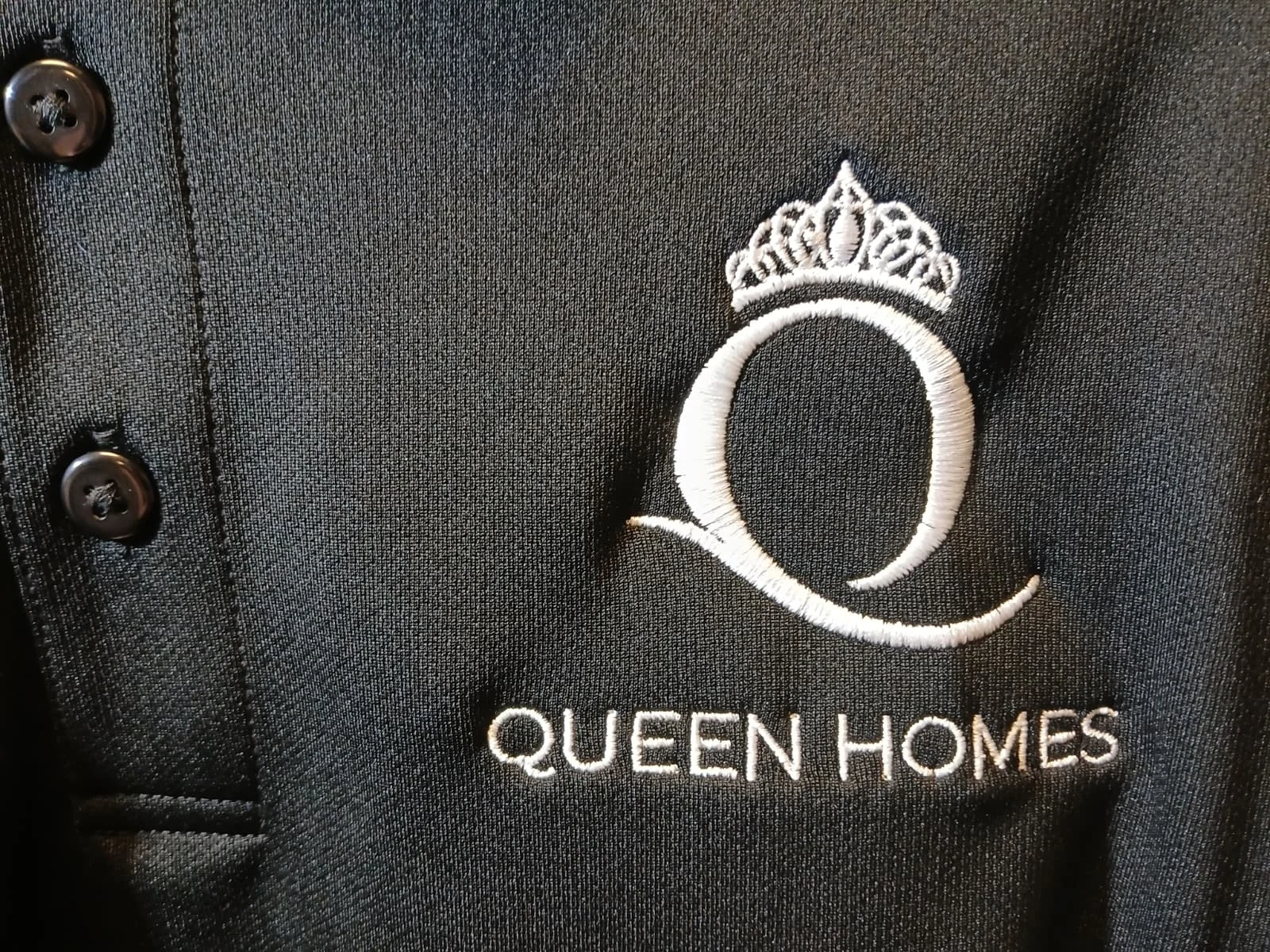 Queens Homes | Clean, Professional Embroidered Apparel