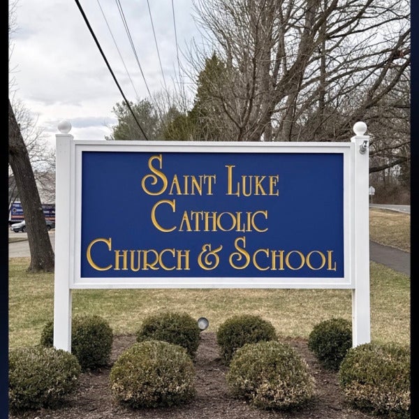 Custom HDU Post & Panel Entrance Sign for Saint Luke Catholic Church & School in McLean, VA | Royal Blue & Gold Church Signage