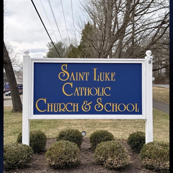 Custom HDU Post & Panel Entrance Sign for Saint Luke Catholic Church & School in McLean, VA | Royal Blue & Gold Church Signage