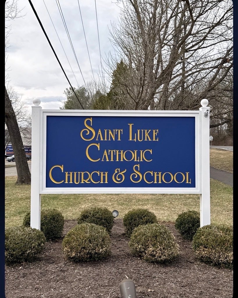 Custom HDU Post & Panel Entrance Sign for Saint Luke Catholic Church & School in McLean, VA | Royal Blue & Gold Church Signage