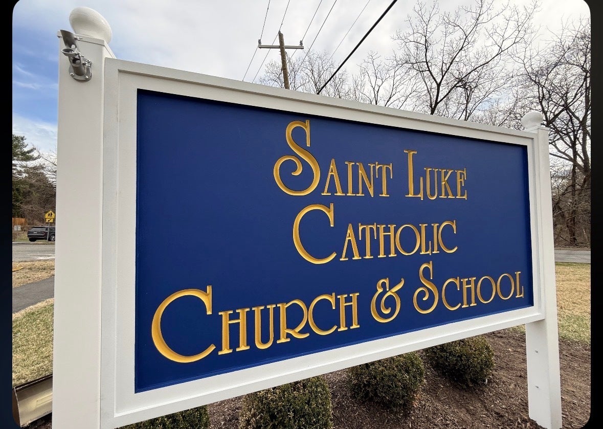 Custom HDU Post & Panel Entrance Sign for Saint Luke Catholic Church & School in McLean, VA | Royal Blue & Gold Church Signage
