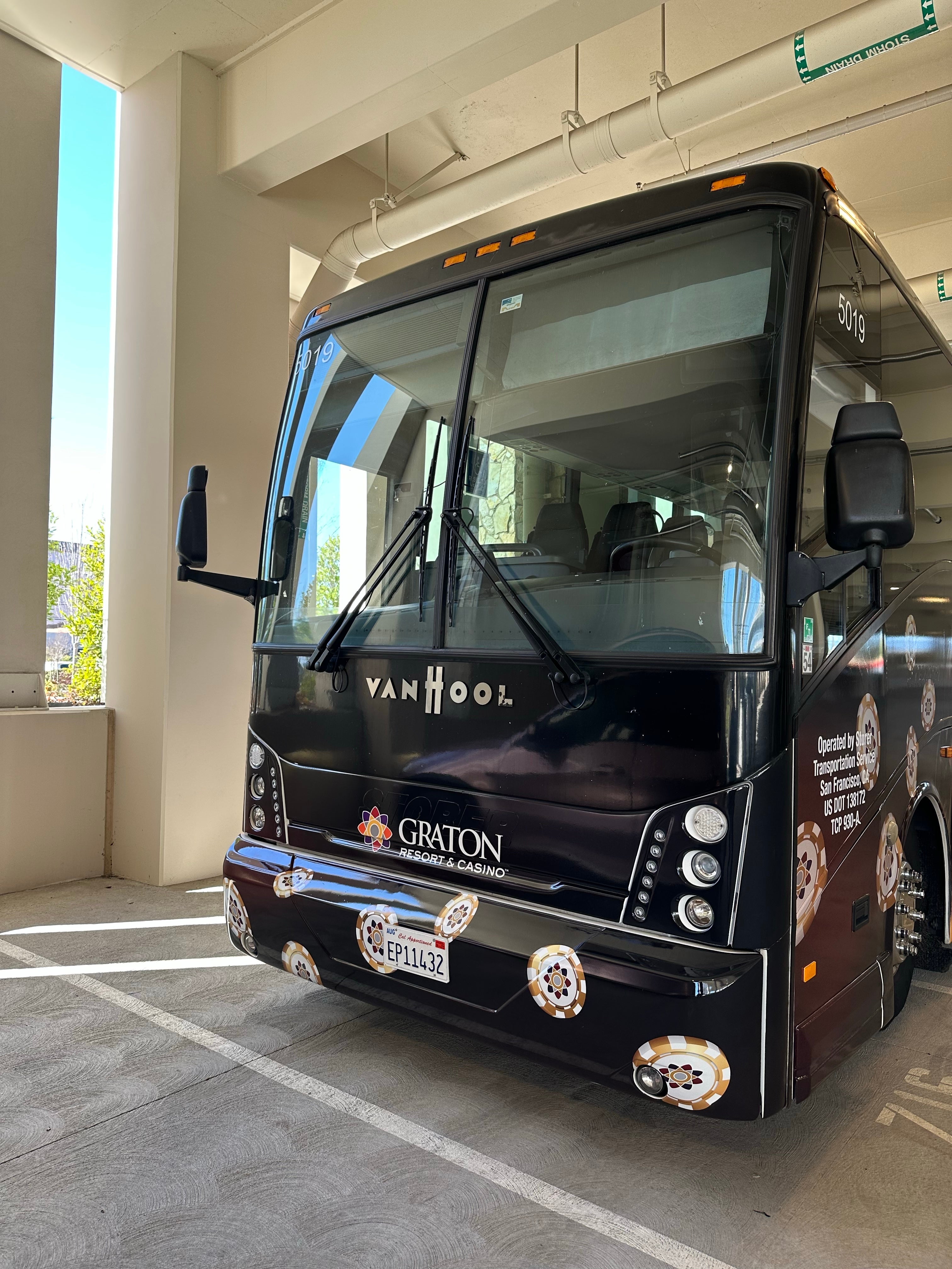 Front view of a Graton Casino branded bus wrap