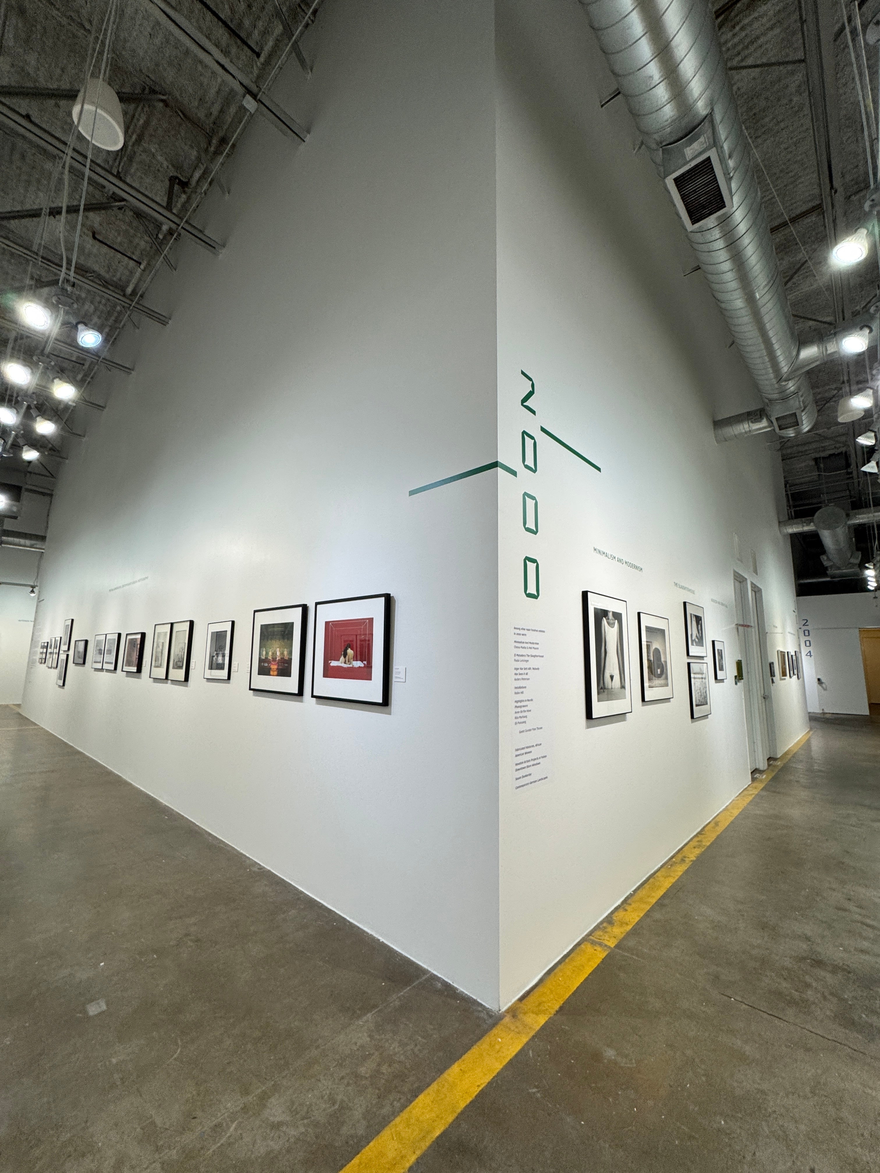 Transforming FotoFest: Stunning Vinyl Wall Graphics for a Global Visions – FotoFest at 40