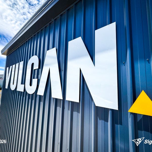 Large ACM cut building letters and precision vinyl cut lettering installed by Signarama Springwood for Vulcan Steel in Toowoomba, Queensland, featuring bold exterior signage mounte...