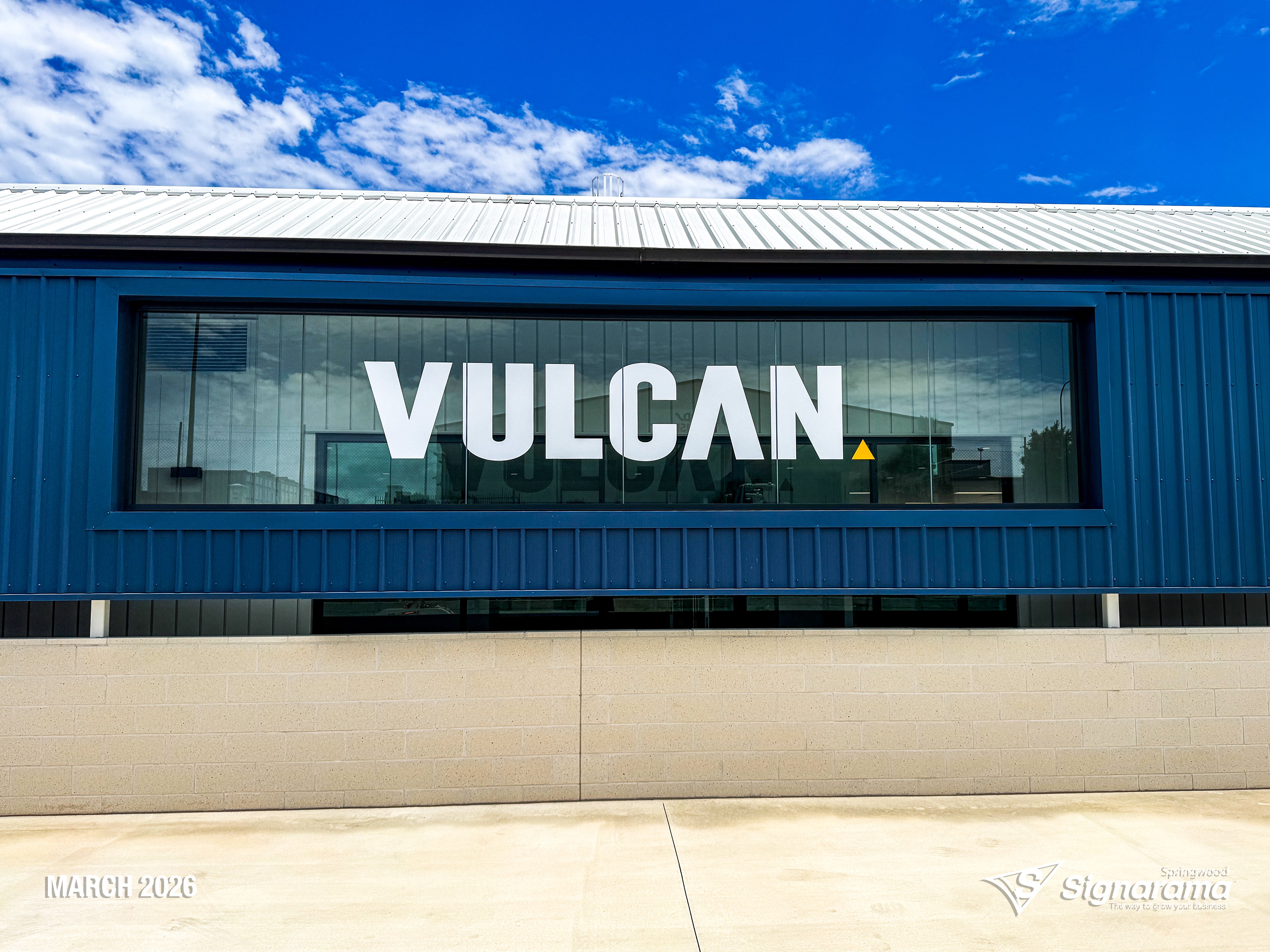 Large ACM cut building letters and precision vinyl cut lettering installed by Signarama Springwood for Vulcan Steel in Toowoomba, Queensland, featuring bold exterior signage mounte...