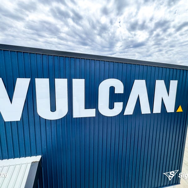 Large ACM cut building letters and precision vinyl cut lettering installed by Signarama Springwood for Vulcan Steel in Toowoomba, Queensland, featuring bold exterior signage mounte...