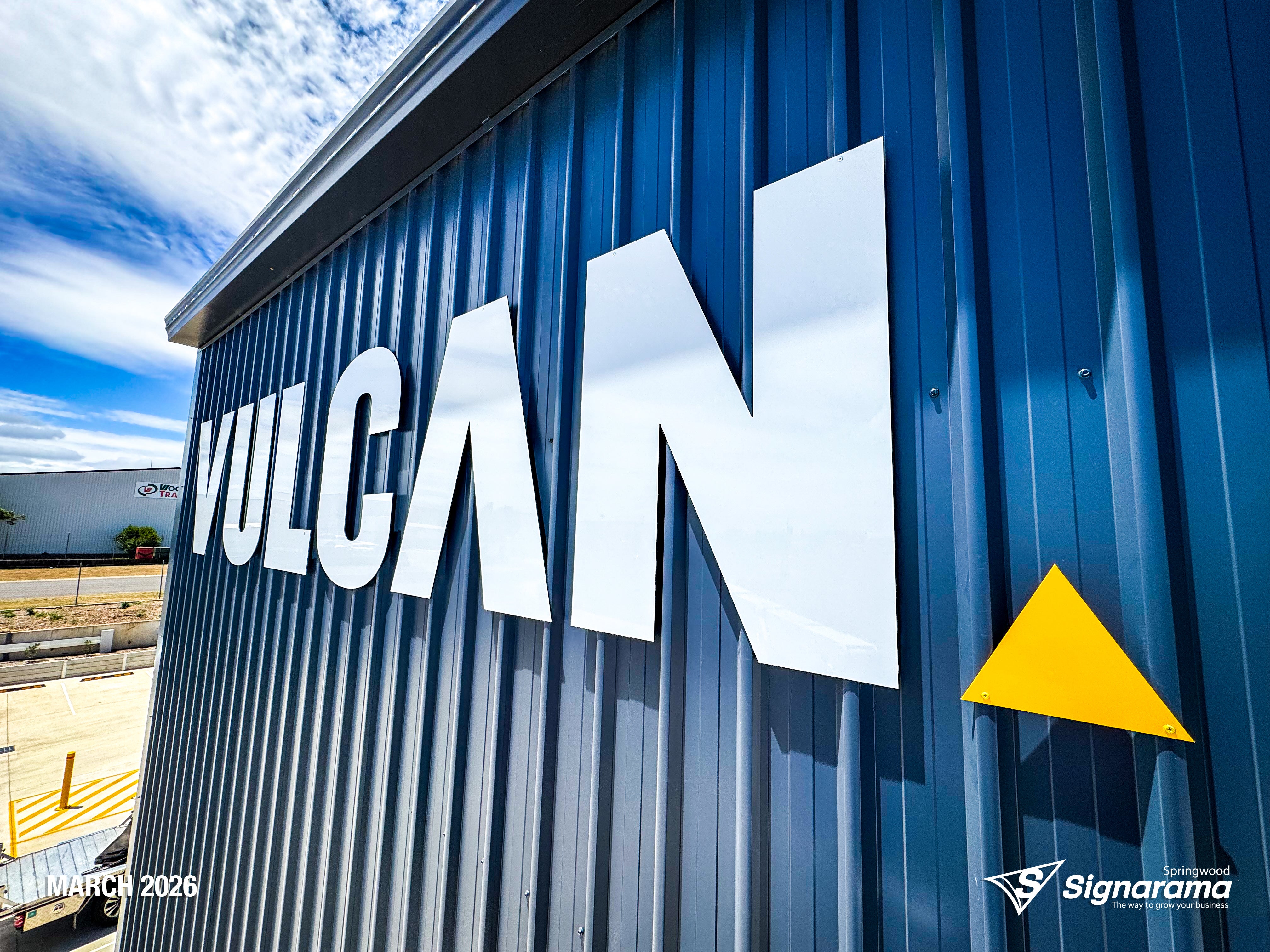 Large ACM cut building letters and precision vinyl cut lettering installed by Signarama Springwood for Vulcan Steel in Toowoomba, Queensland, featuring bold exterior signage mounte...