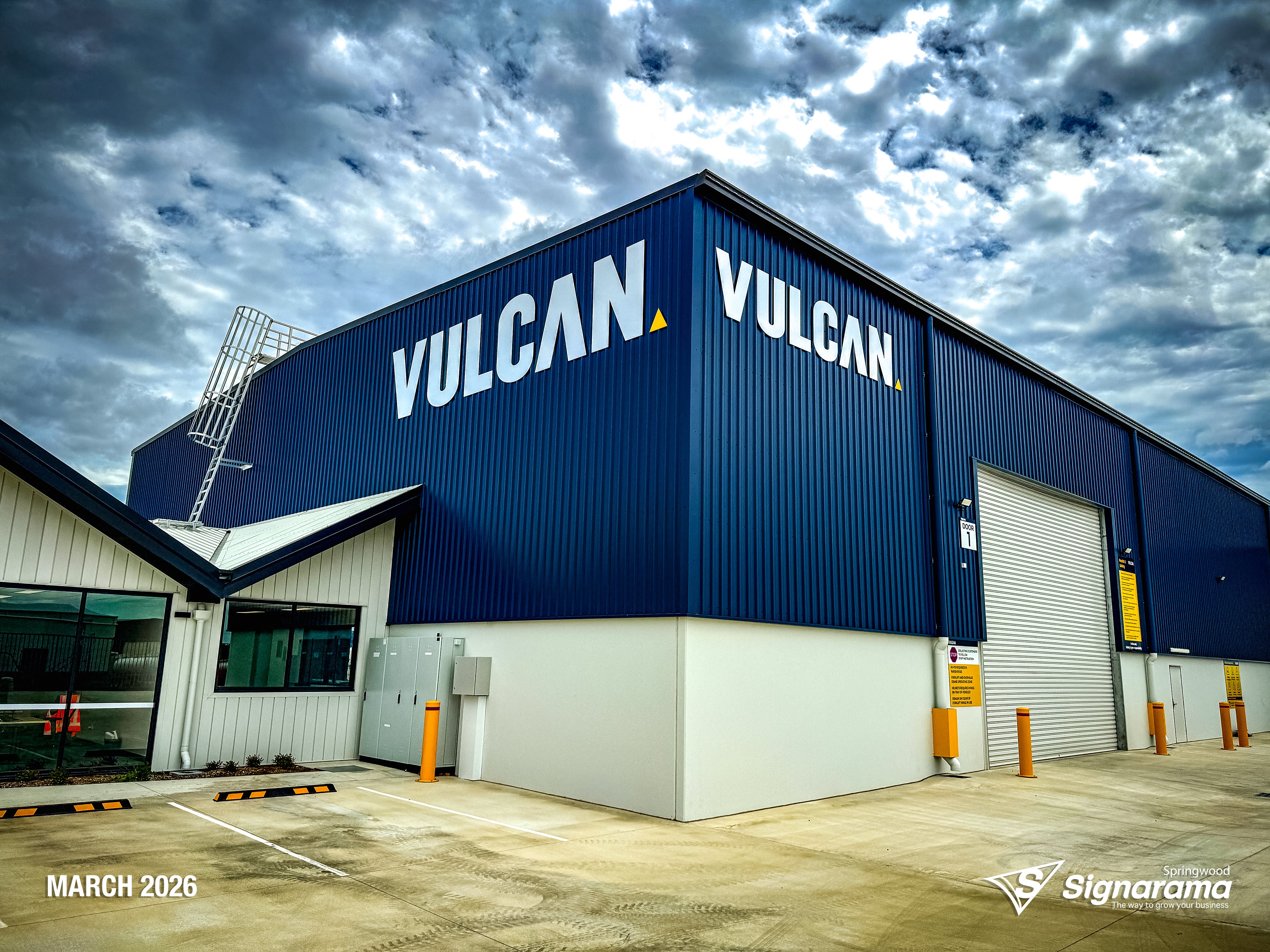 Large ACM cut building letters and precision vinyl cut lettering installed by Signarama Springwood for Vulcan Steel in Toowoomba, Queensland, featuring bold exterior signage mounte...