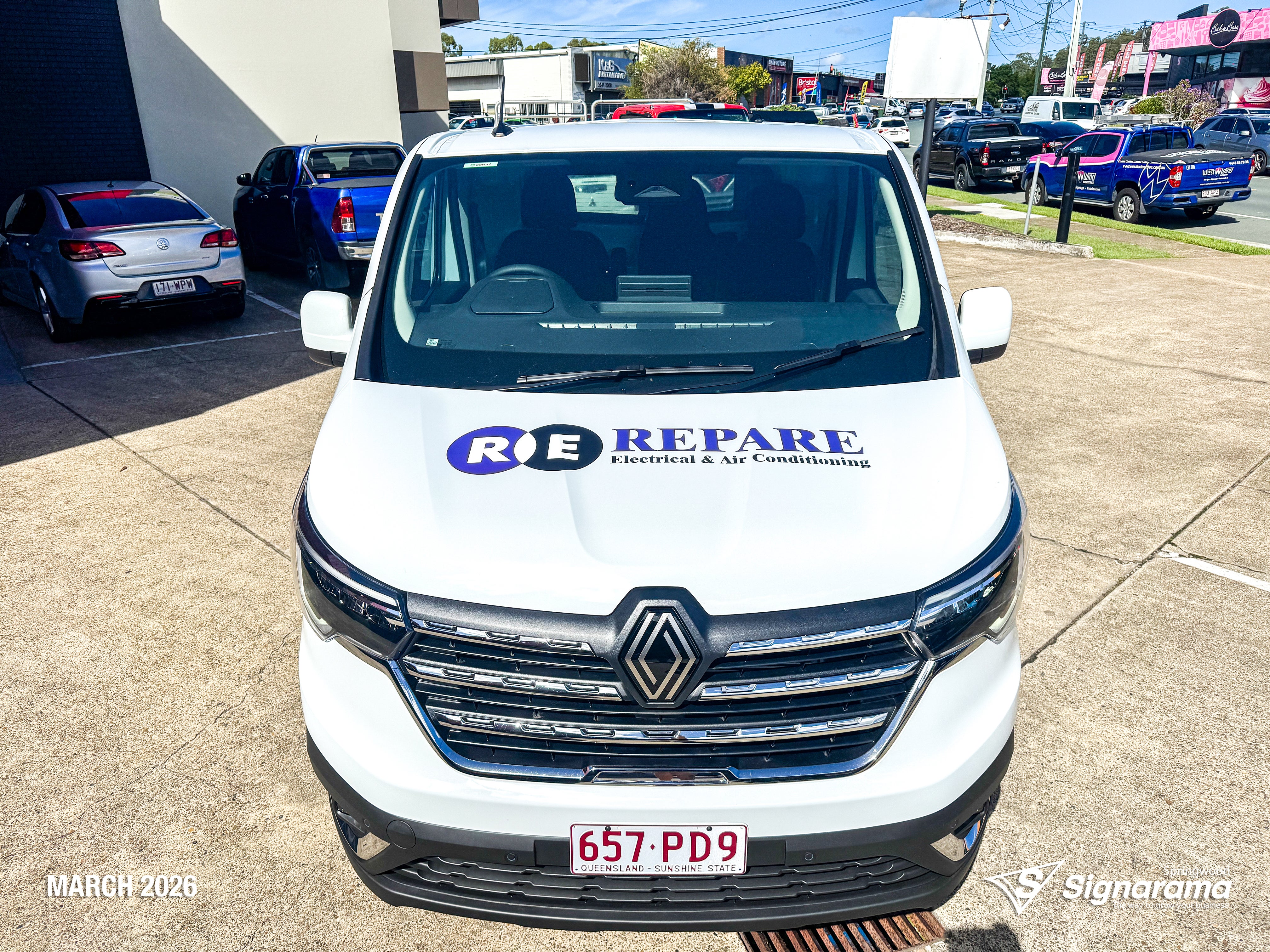Repare Electrical work van with professionally installed vehicle graphics by Signarama Springwood, featuring bold branding and contact details designed to promote the electrical bu...