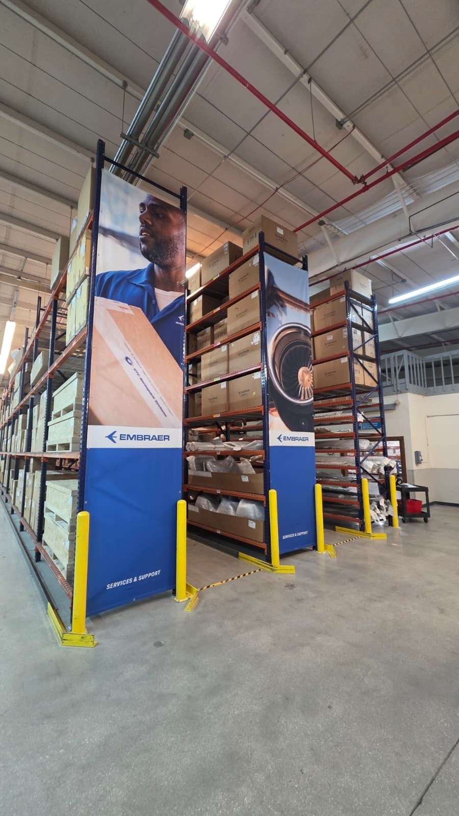Embraer Facility – Interior Branding & Rack Graphics