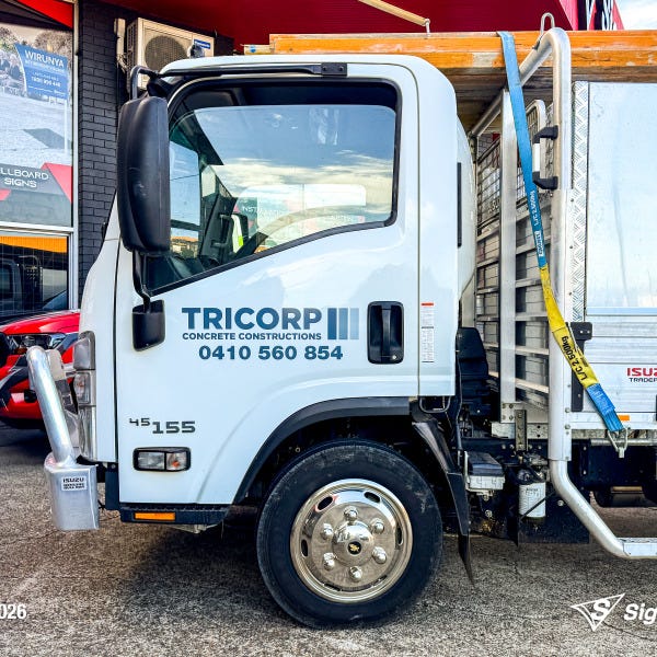 Signarama Springwood truck door vehicle graphics installed for Tricorp Concrete Constructions, featuring professional business branding on a work truck for mobile advertising.