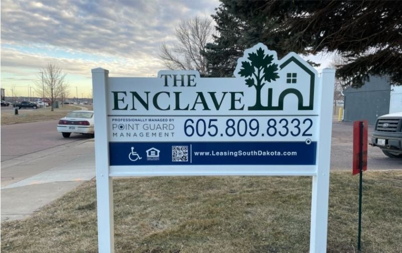 The Enclave real estate sign