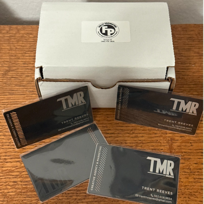 https://cdn.gorilladash.com/images/media/20673789/fully-promoted-usa-metal-business-cards-square-69c6c28619710.png?auto=webp&crop=1%3A1%2Csmart&width=400