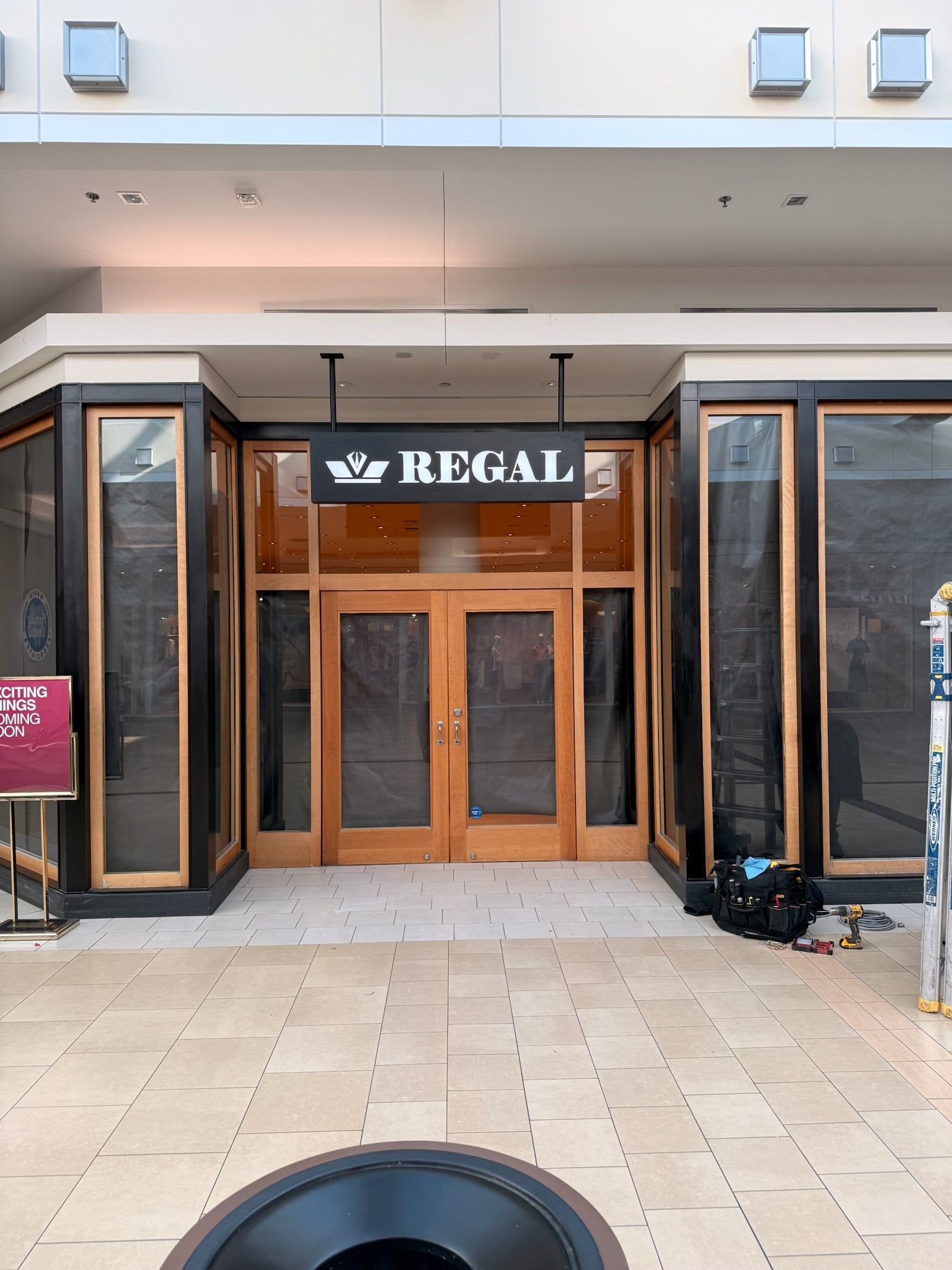 Store Interior Signs Interior Hanging Signs That Elevate Retail Spaces