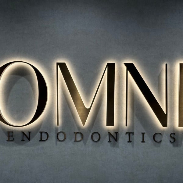 Lobby Sign Upgrade in Northern VA | Omni Endodontics Bronze Dimensional Letters Added for Elevated Branding