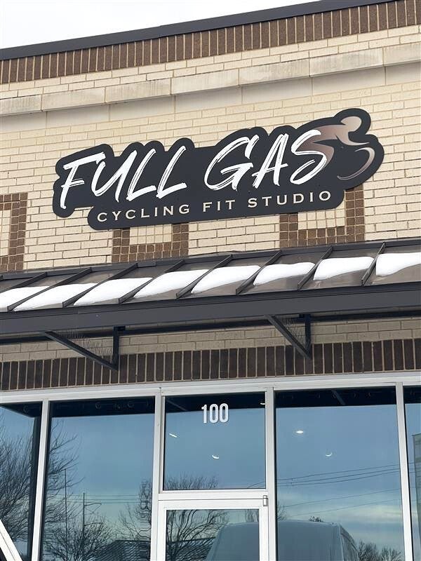Full Gas Cycling Fit Studio Elevates Their Brand with a Cohesive Exterior & Interior Signage Package