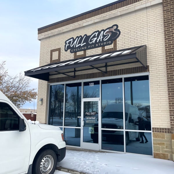 Full Gas Cycling Fit Studio Elevates Their Brand with a Cohesive Exterior & Interior Signage Package