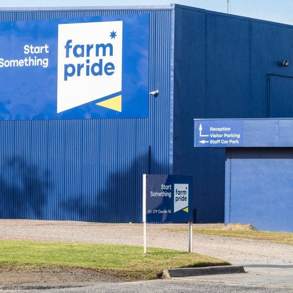 Large branded Metal Sign on the side of an industrial building. | Signarama