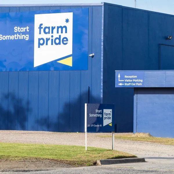 Large branded Metal Sign on the side of an industrial building. | Signarama