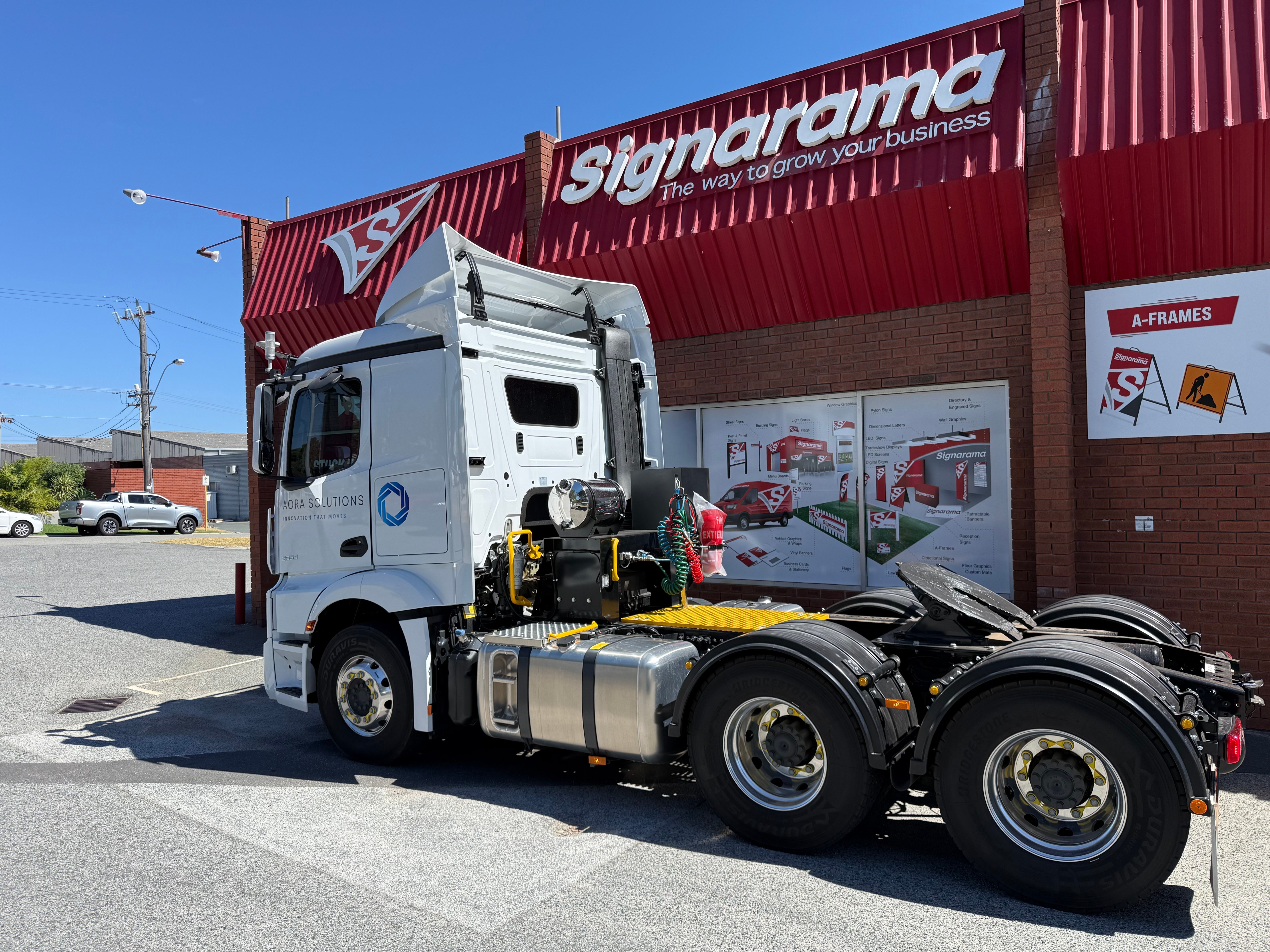 Signage for the Future: Wrapping Aora Solutions' Autonomous Mobility Trucks