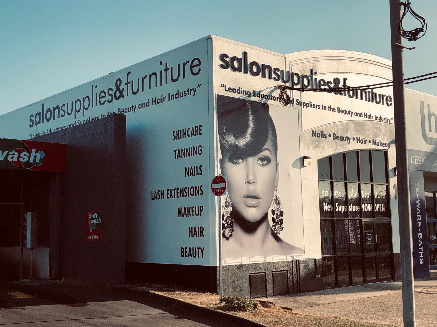 Salon Supplies and Furniture - Black and White themed signage for new premises