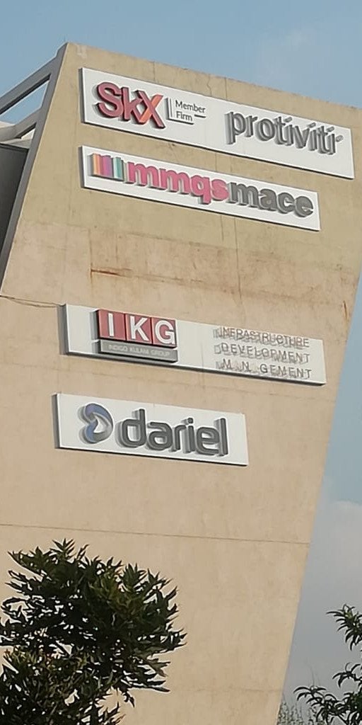 Dariel and Sekela Xabiso Perspex Fabricates Building Signage