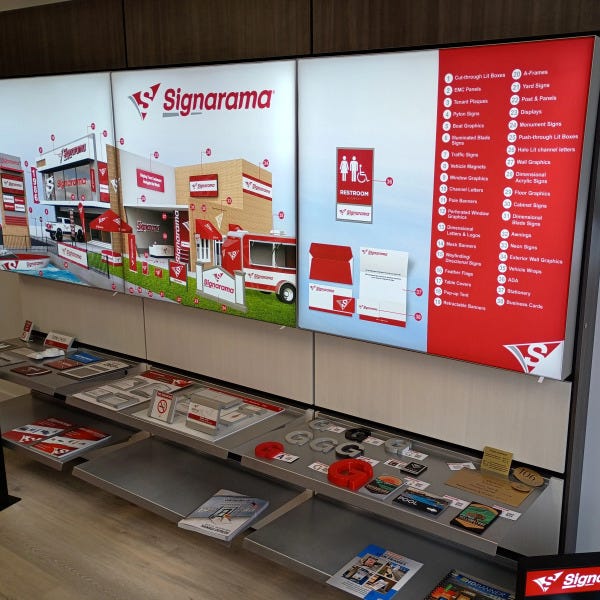 Signarama Nampa lobby showroom featuring illuminated signage displays, custom graphics samples, and branded signage solutions for local businesses