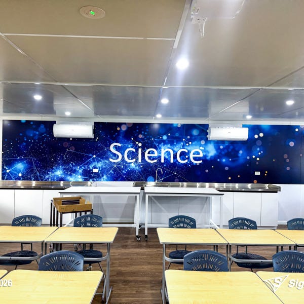 Signarama Springwood custom science classroom wall graphics created and installed at Kimberley College, transforming classroom walls with educational themed graphics.
