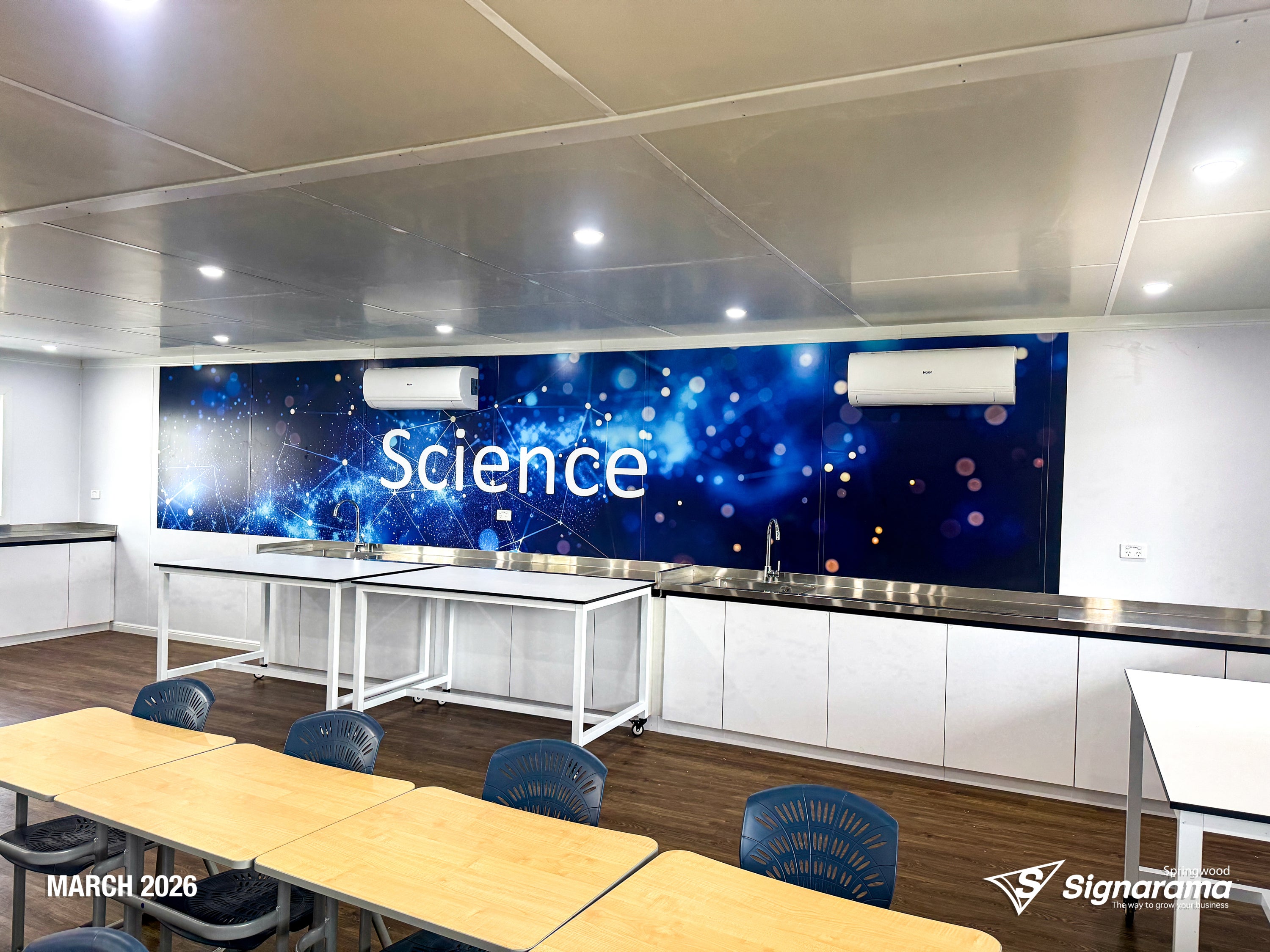 Signarama Springwood custom science classroom wall graphics created and installed at Kimberley College, transforming classroom walls with educational themed graphics.