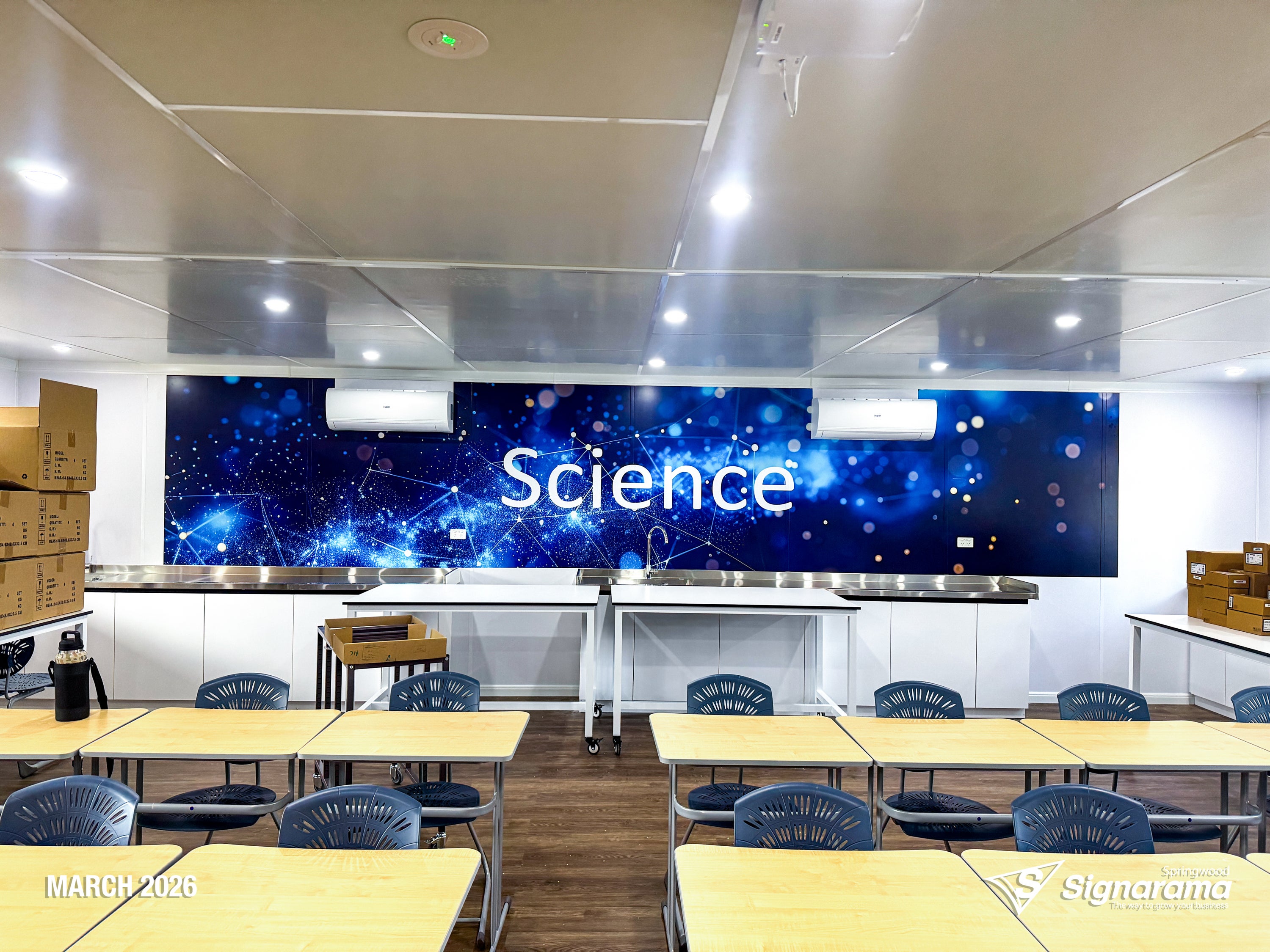 Signarama Springwood custom science classroom wall graphics created and installed at Kimberley College, transforming classroom walls with educational themed graphics.