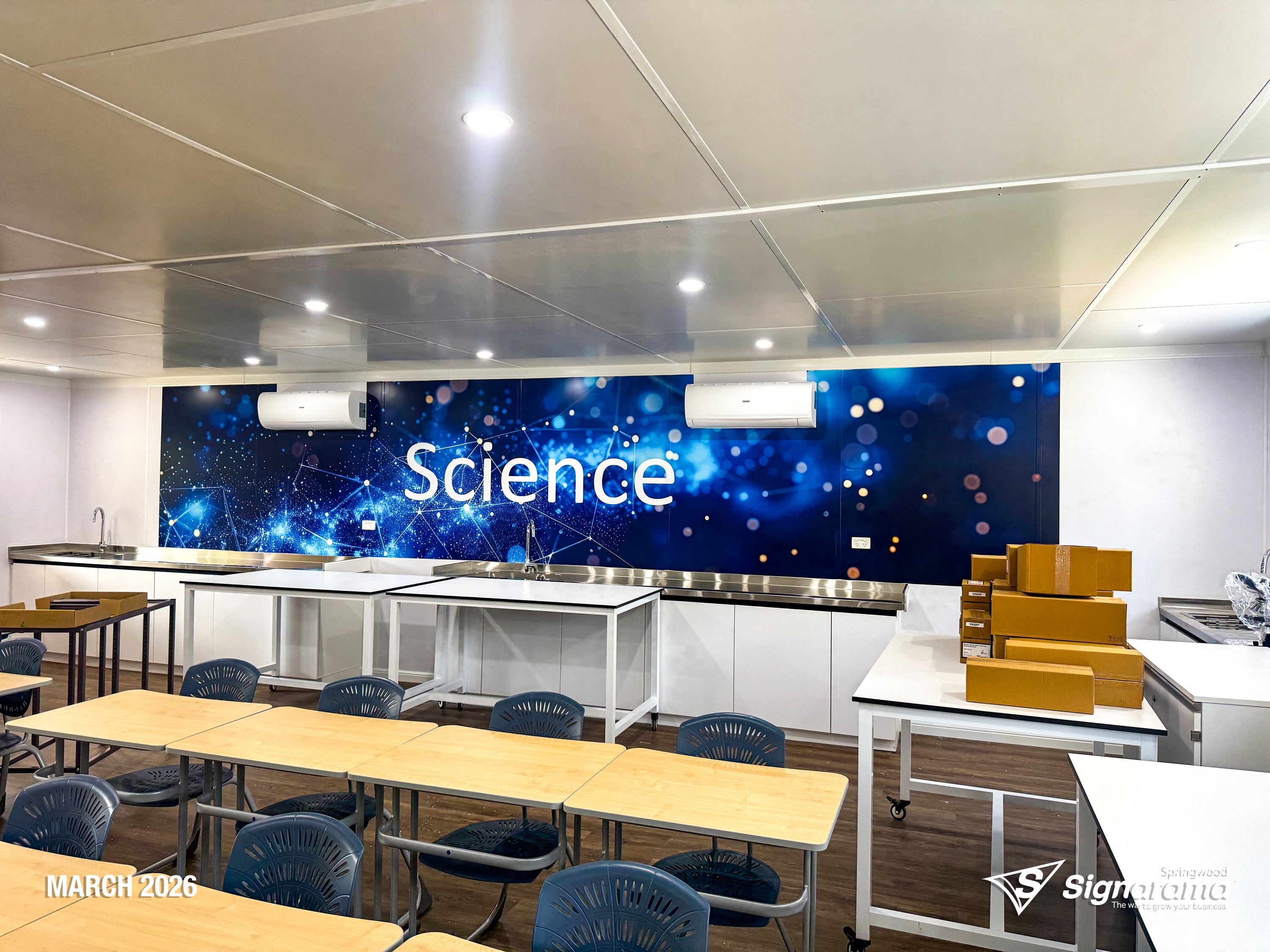 Signarama Springwood custom science classroom wall graphics created and installed at Kimberley College, transforming classroom walls with educational themed graphics.