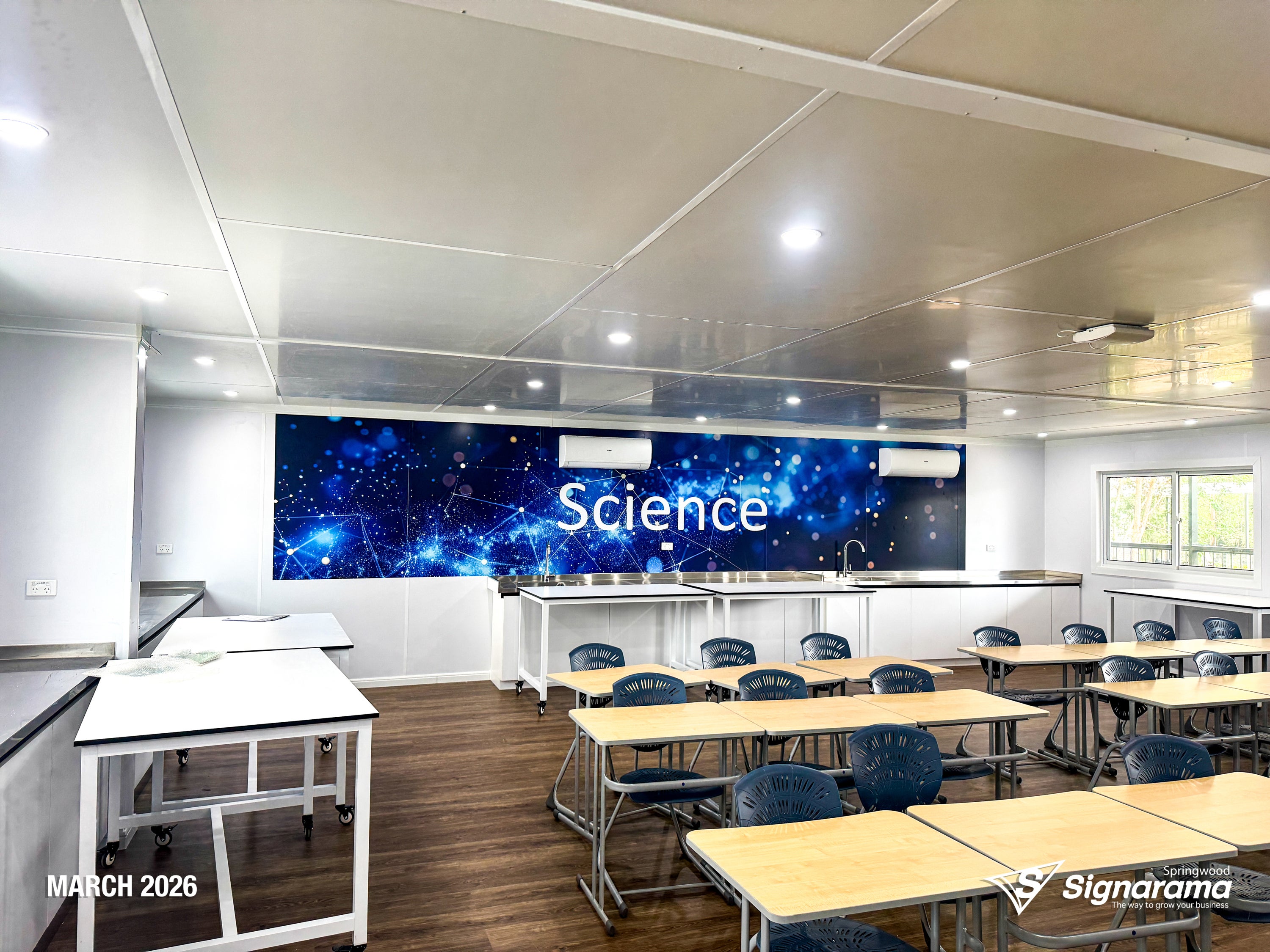 Signarama Springwood custom science classroom wall graphics created and installed at Kimberley College, transforming classroom walls with educational themed graphics.