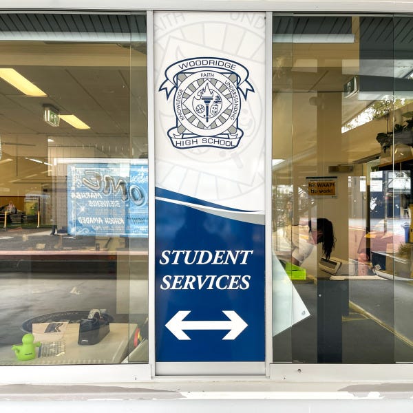 Window graphics replaced by Signarama Springwood at Woodridge State High School for Student Services and Finance offices, featuring clean frosted vinyl signage that improves privac...
