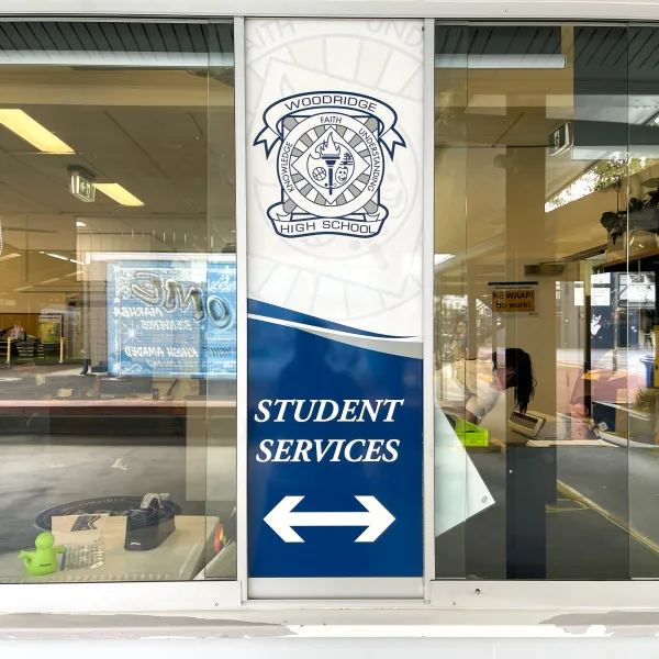 Window graphics replaced by Signarama Springwood at Woodridge State High School for Student Services and Finance offices, featuring clean frosted vinyl signage that improves privac...