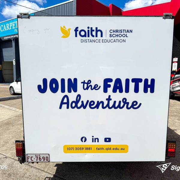 Trailer graphics installed by Signarama Springwood for Faith Christian School, featuring bold, professional vinyl graphics applied to a trailer for mobile branding and increased vi...