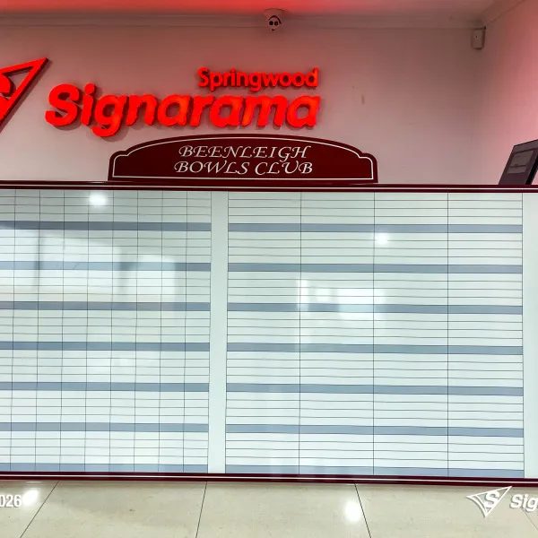 Custom magnetic whiteboard with ACM header created by Signarama Springwood for Beenleigh Bowls Club, featuring a durable and professional display solution for schedules and informa...