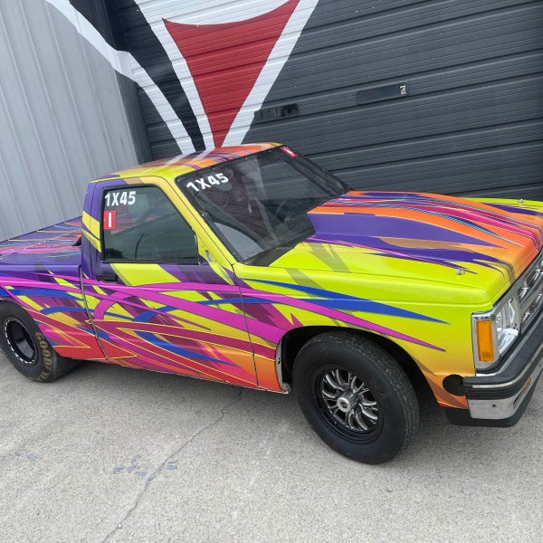 High-Speed Style: Signarama Rivercities Wraps Vibrant Dragster Truck for Racing Family