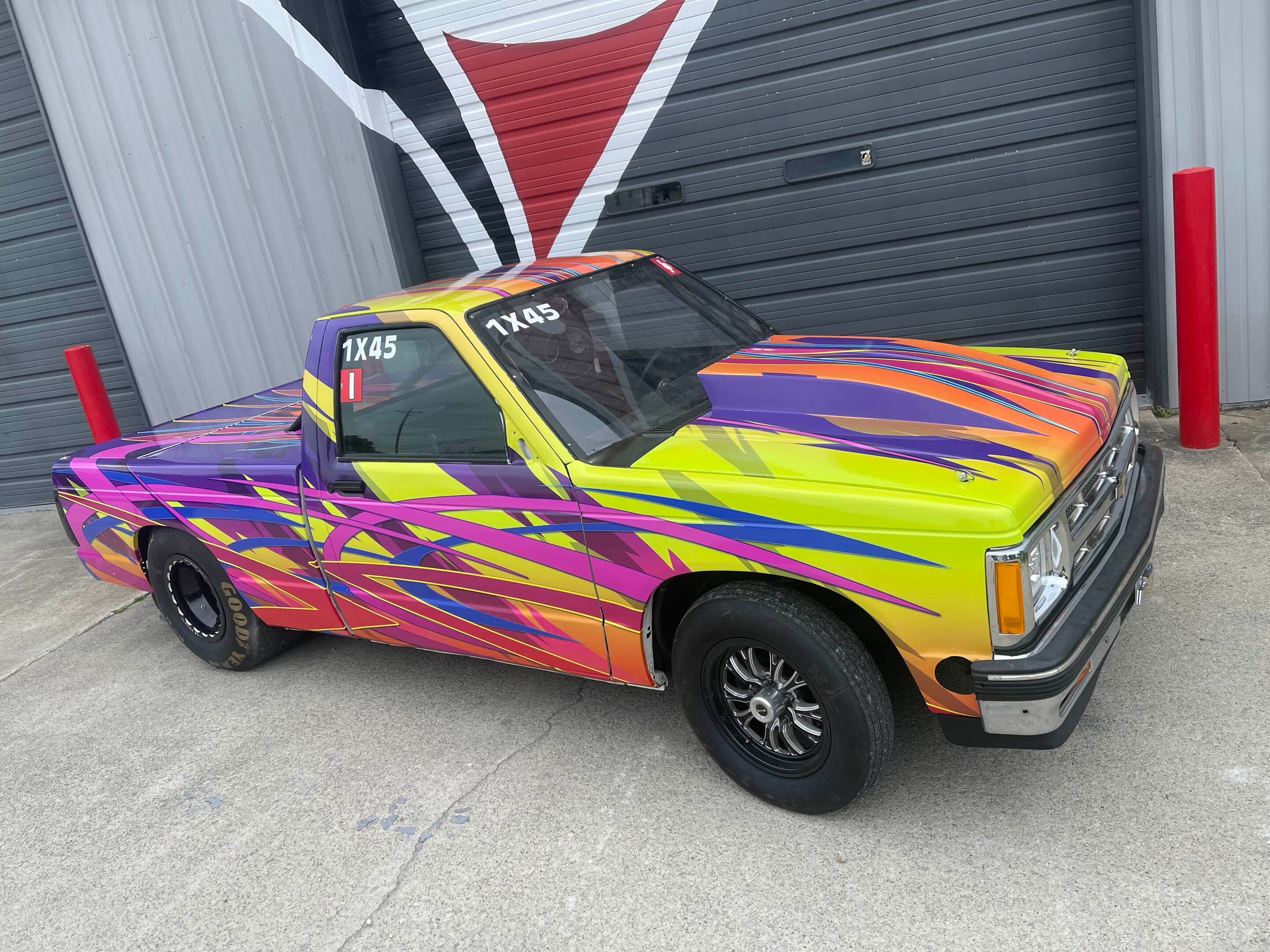 High-Speed Style: Signarama Rivercities Wraps Vibrant Dragster Truck for Racing Family