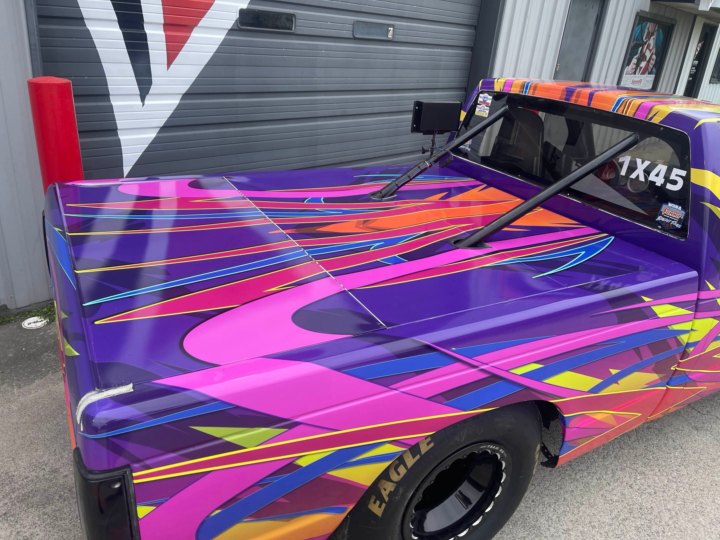 High-Speed Style: Signarama Rivercities Wraps Vibrant Dragster Truck for Racing Family