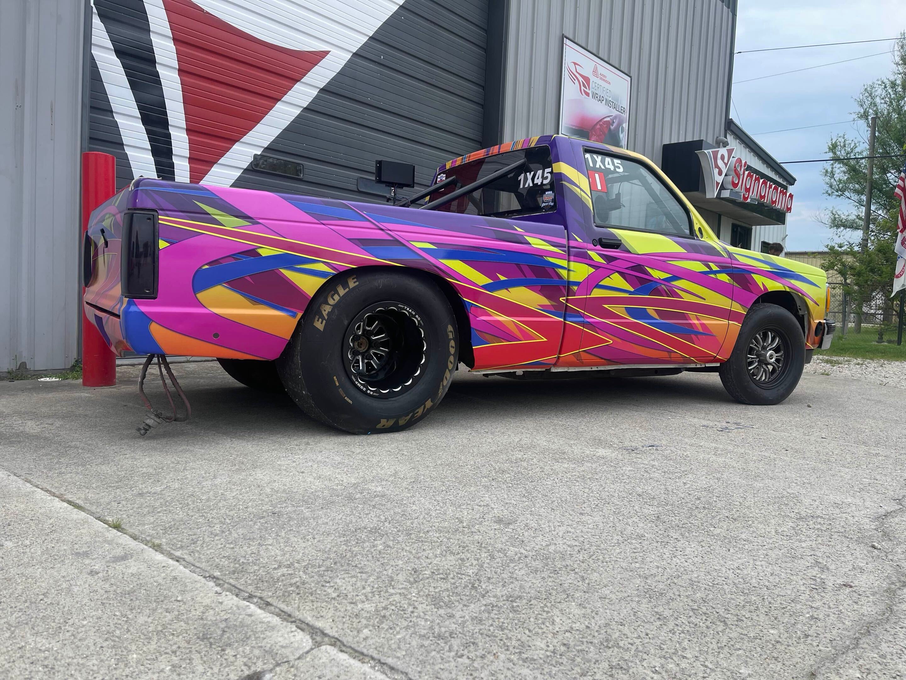 High-Speed Style: Signarama Rivercities Wraps Vibrant Dragster Truck for Racing Family