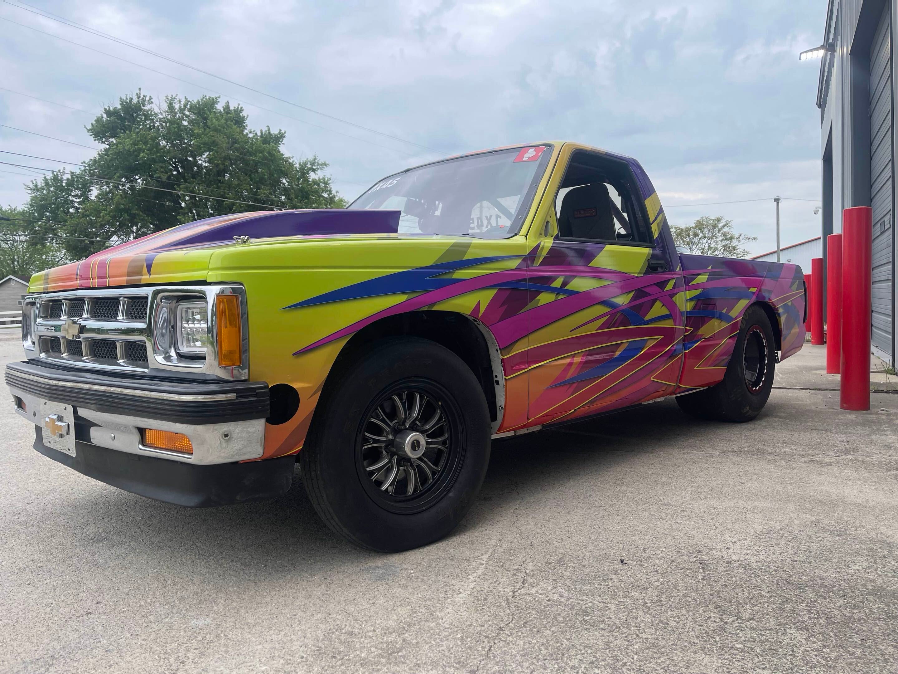 High-Speed Style: Signarama Rivercities Wraps Vibrant Dragster Truck for Racing Family
