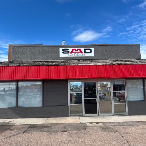 From Design to Installation: How We Built a Bold Building Sign for SAAD Auto Sales in Colorado Springs
