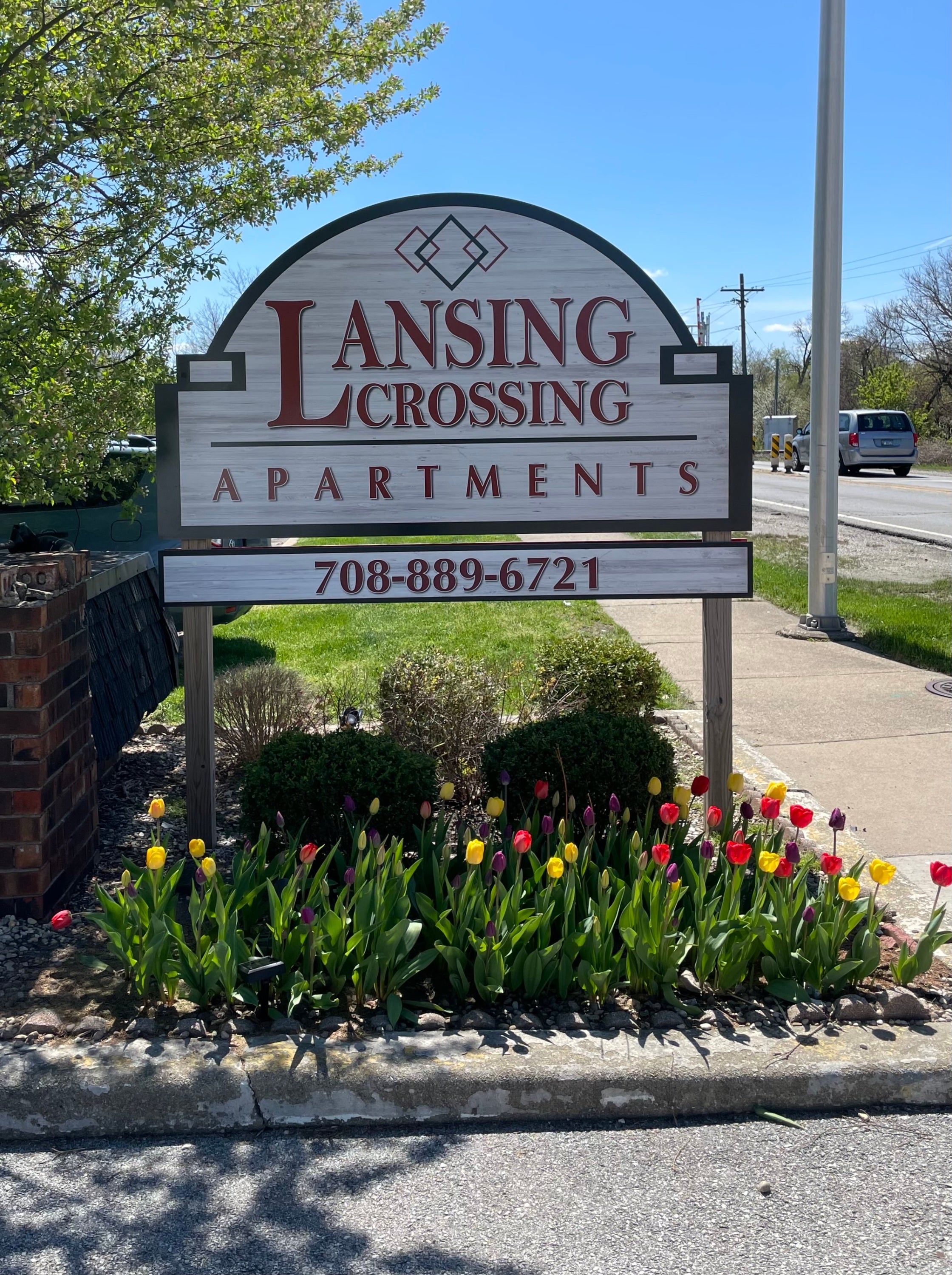 Post and Panel Sign for Lansing Crossing Apartments in IL